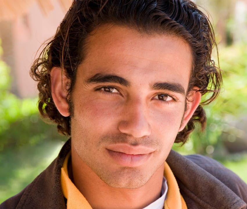 man with jacket looking at camera