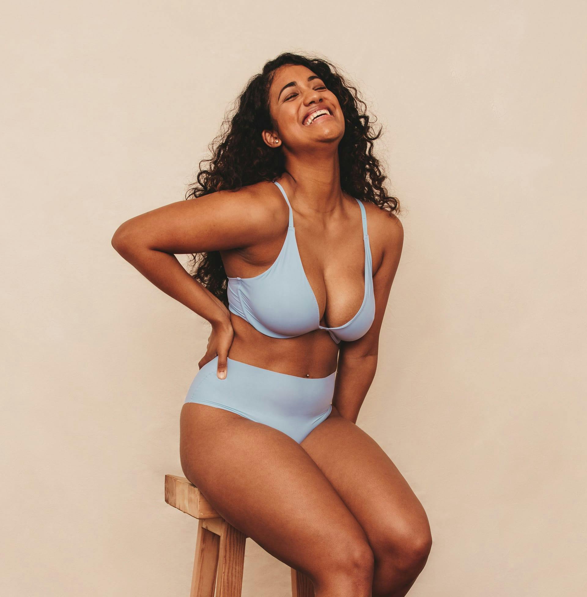 woman in light blue bra and underwear