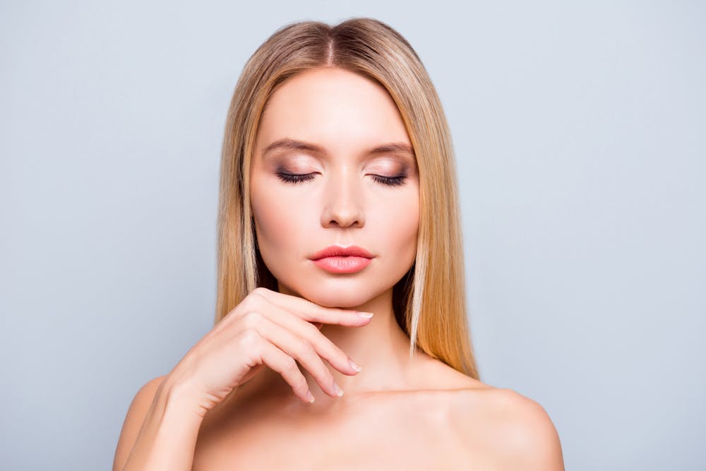 Chin augmentation surgery redefines facial balance, while alternatives like fillers or facial implants offer less invasive options for facial rejuvenation