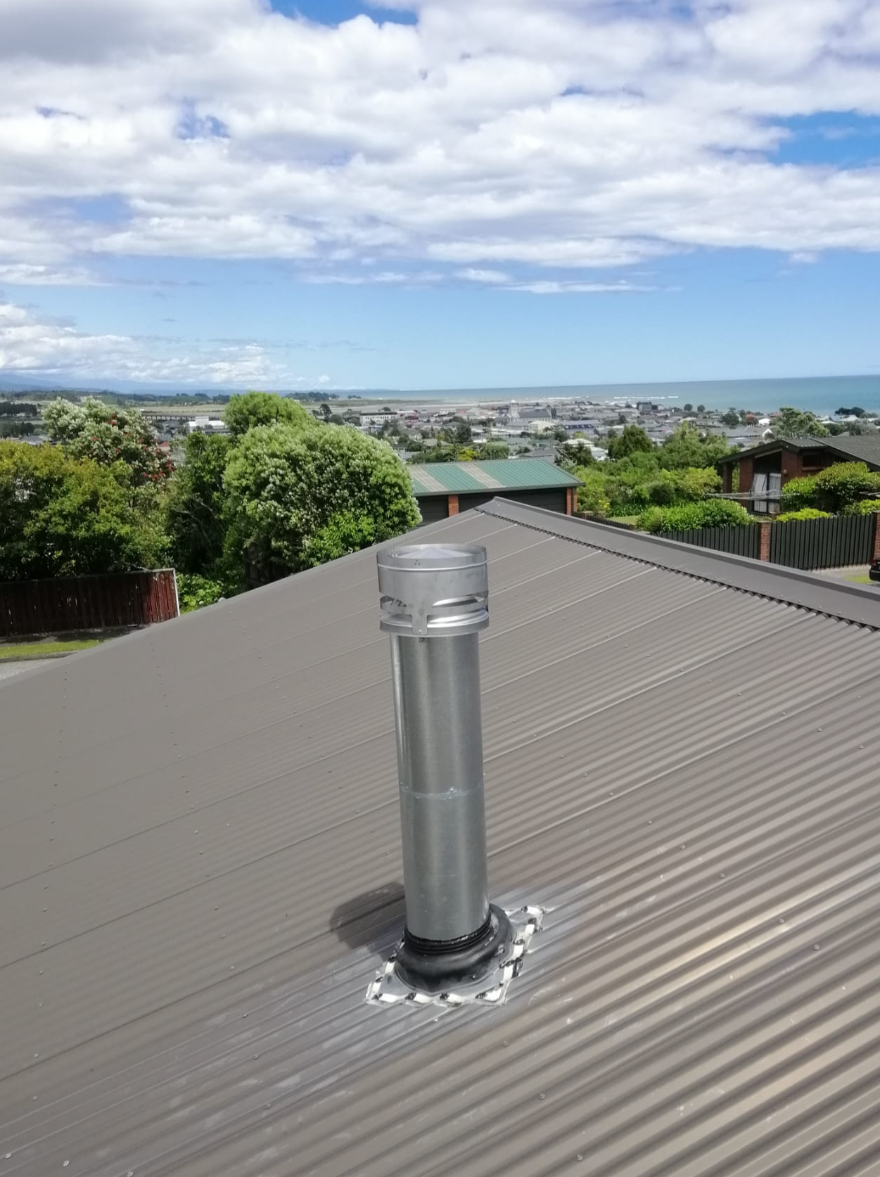 Brand new shiny flue/chimney on roof