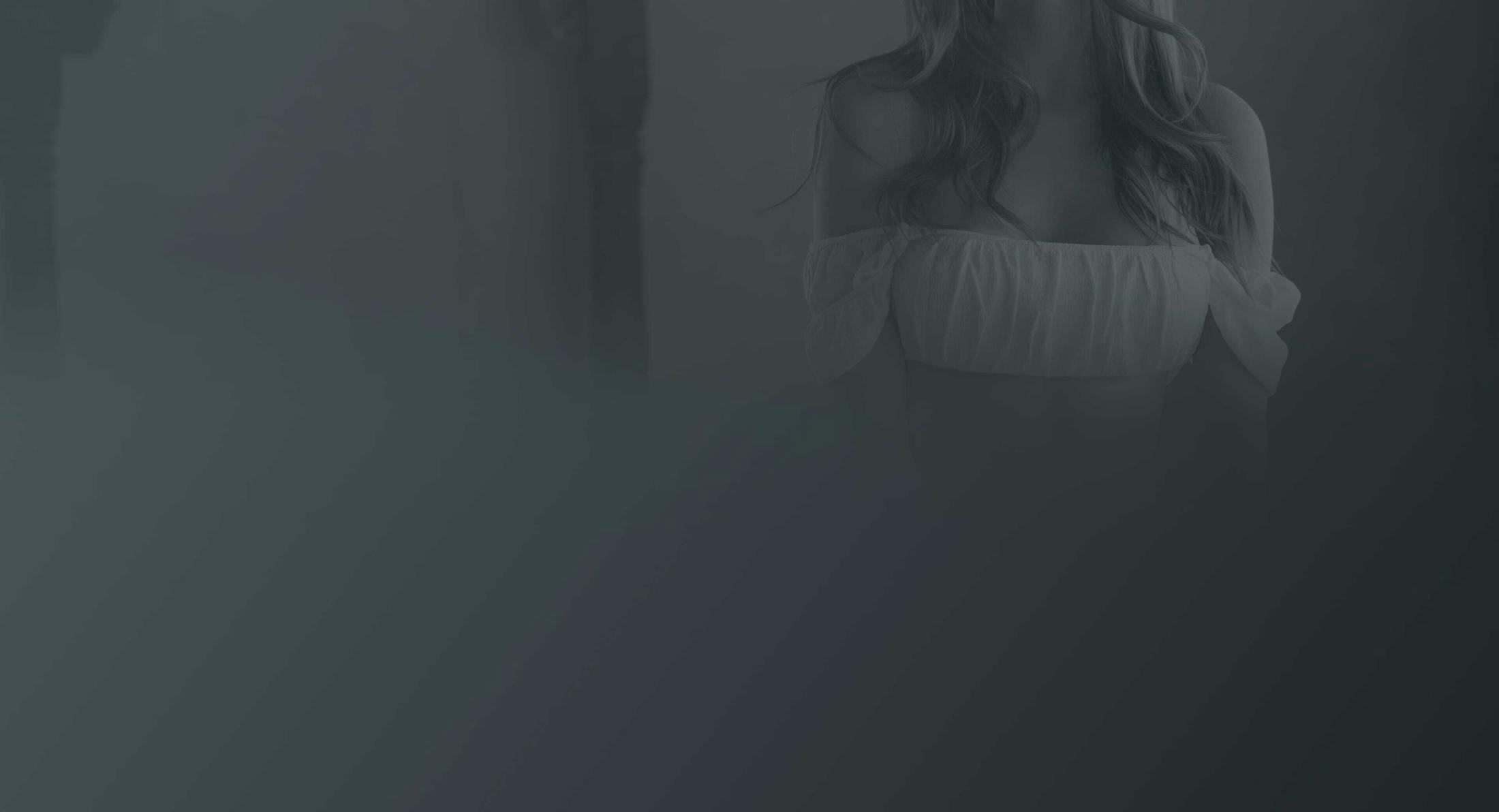 Black and white shot of a woman's torso