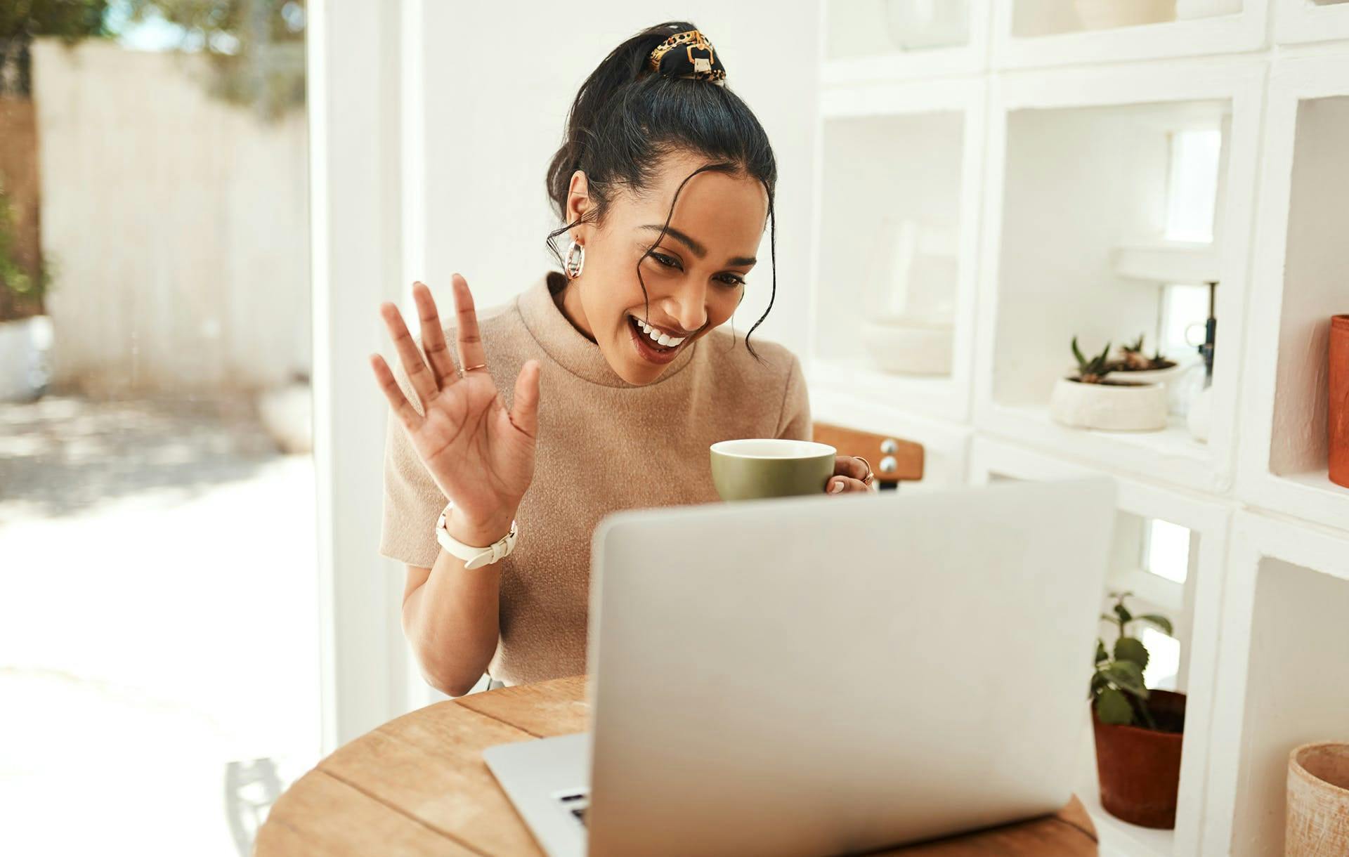 woman happily interacting with computer