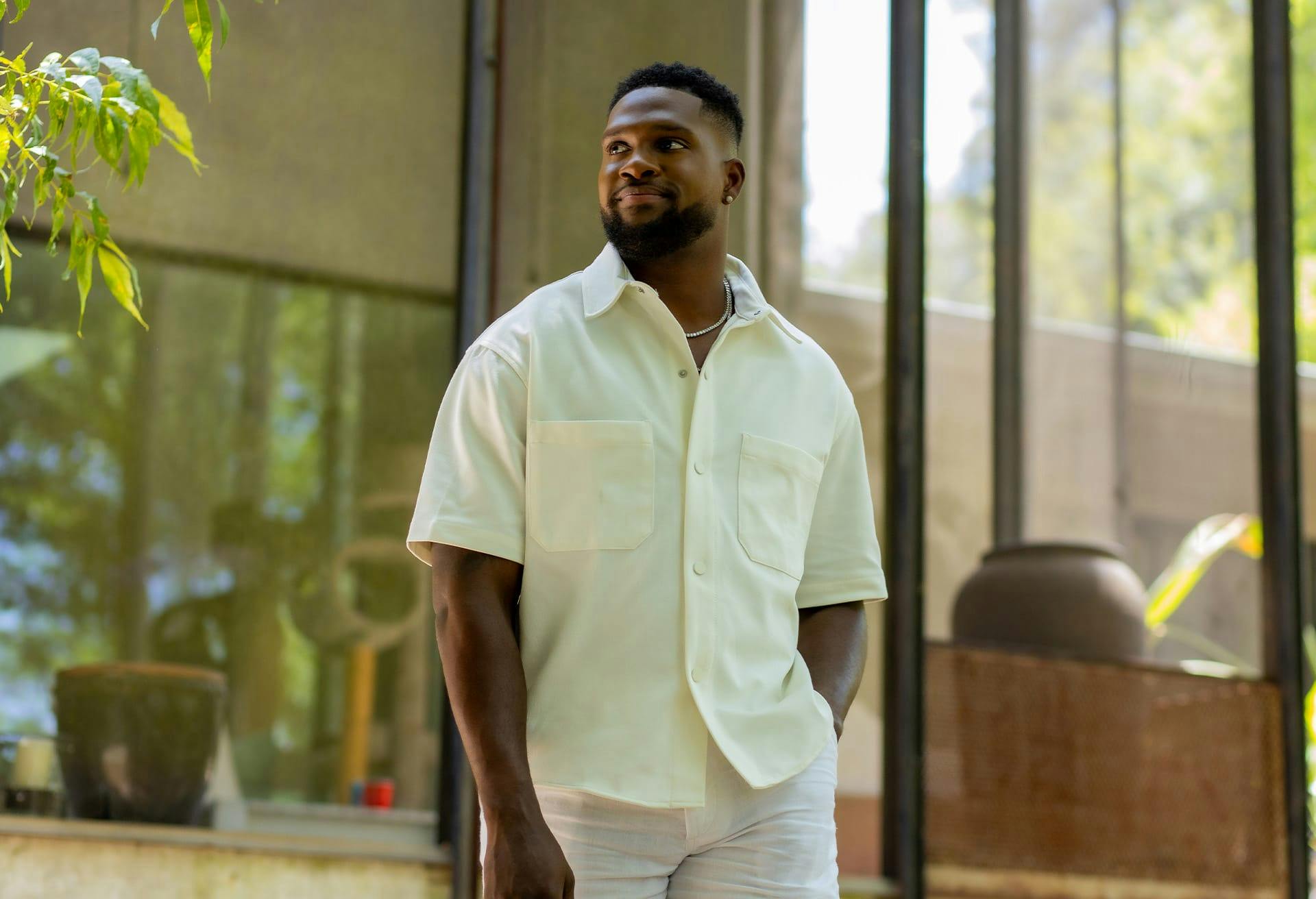 African-American man in white shirt