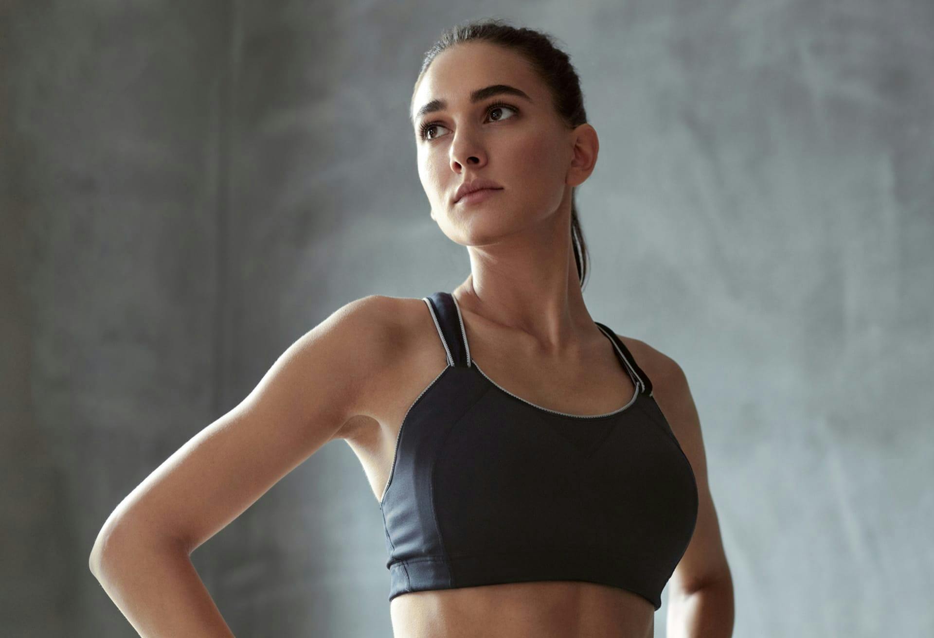 Brunette woman in sports bra