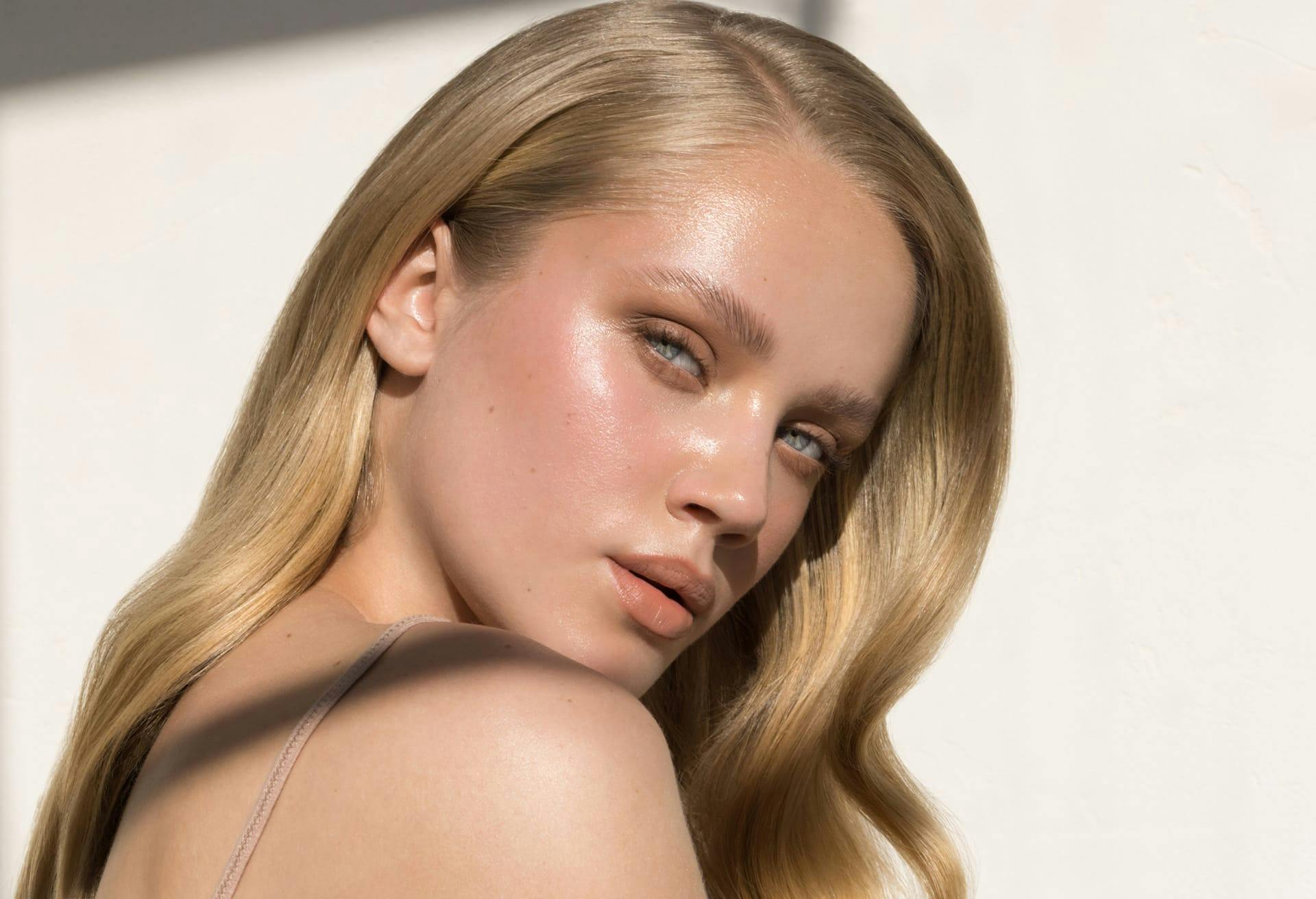 Blonde woman glancing over shoulder