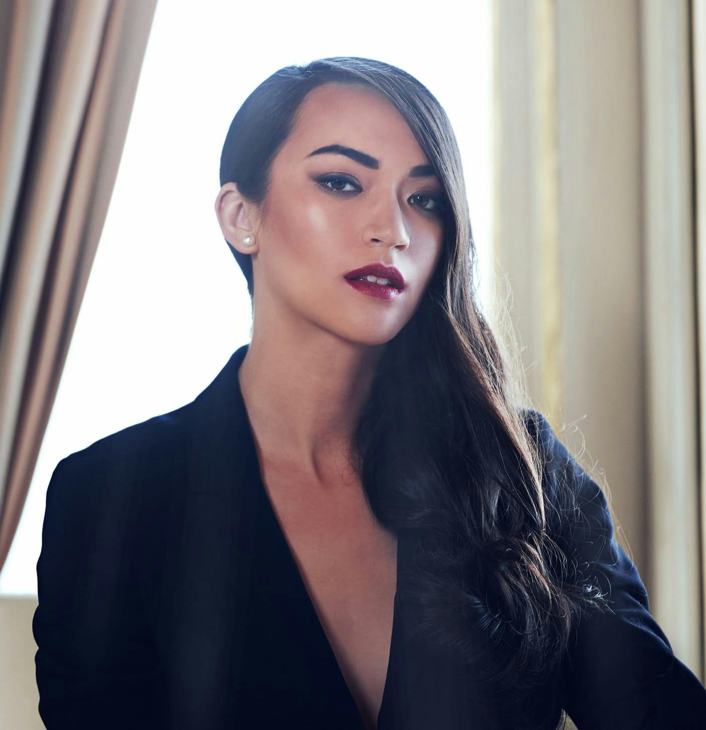 Brunette woman with pearl earring