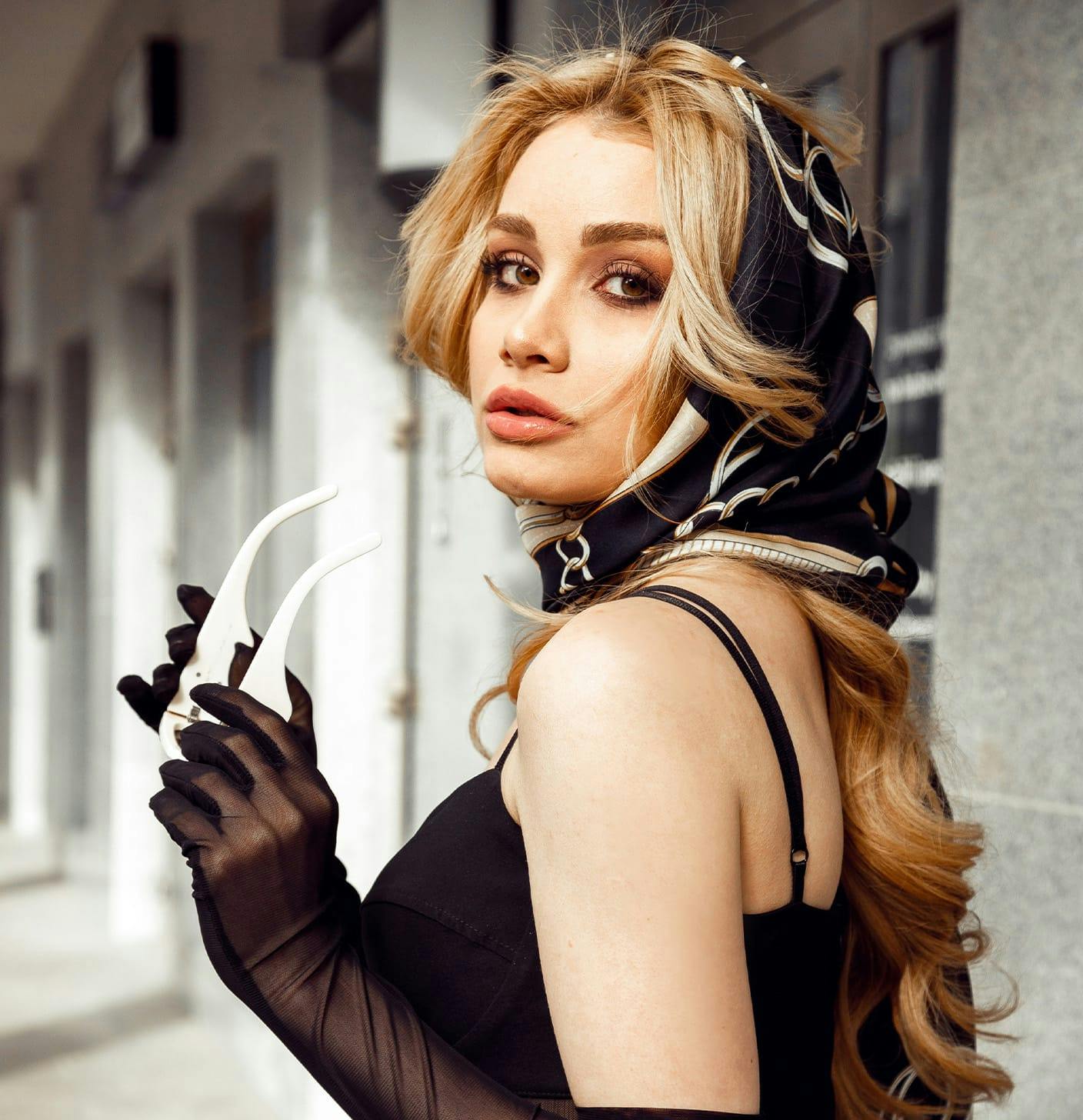 Blonde woman in fashionable clothing