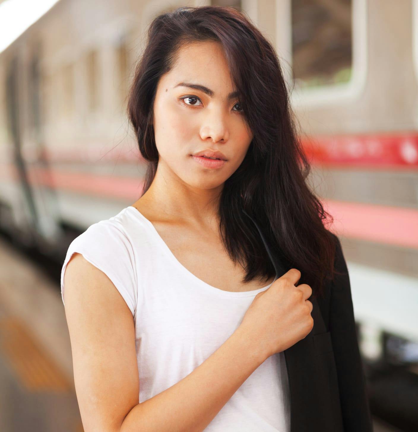 Brunette woman in white top
