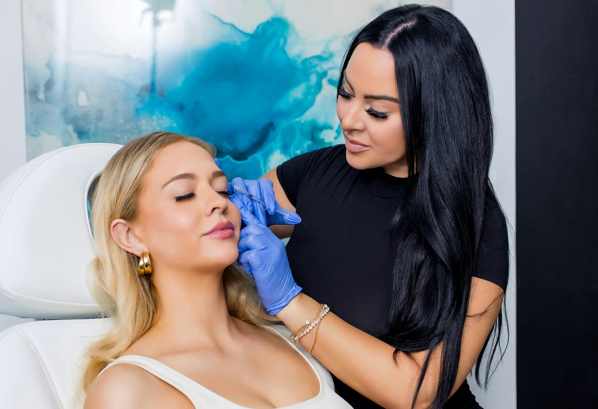 Woman getting facial injections