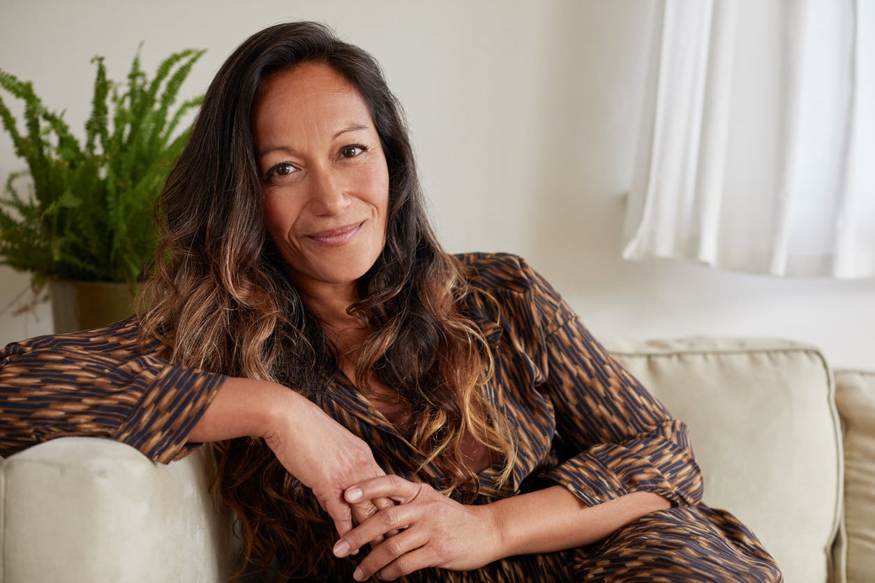 middle aged woman model on couch
