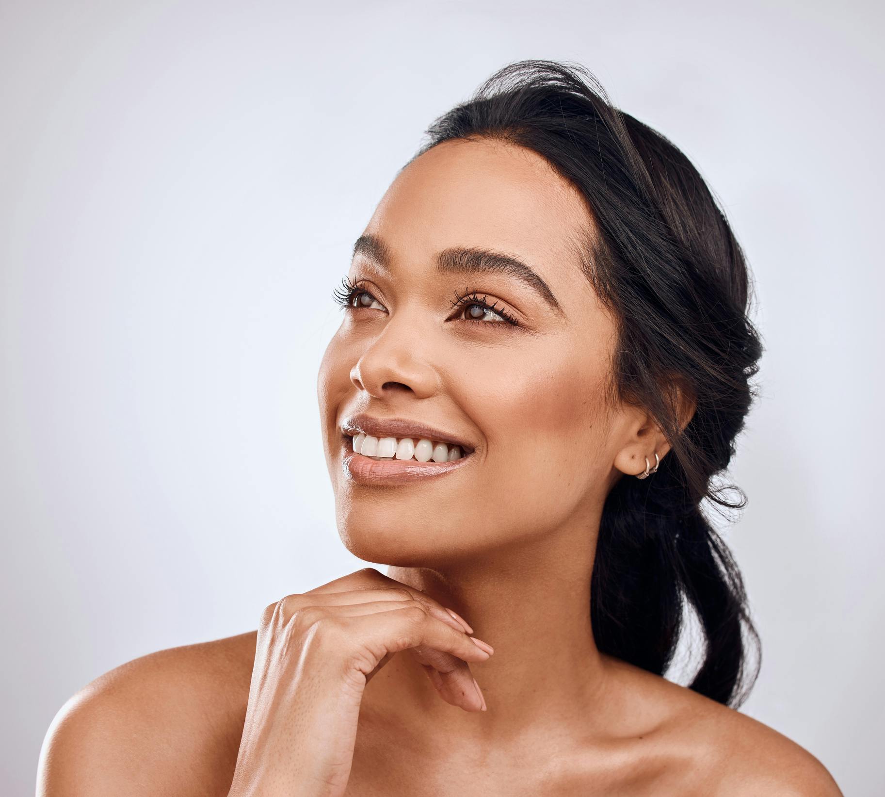 woman with clear skin and dark hair
