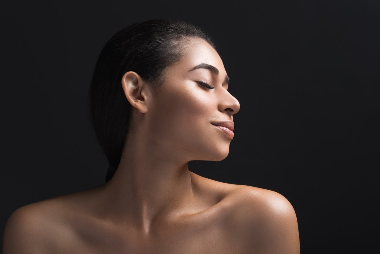 side profile of model with dark hair