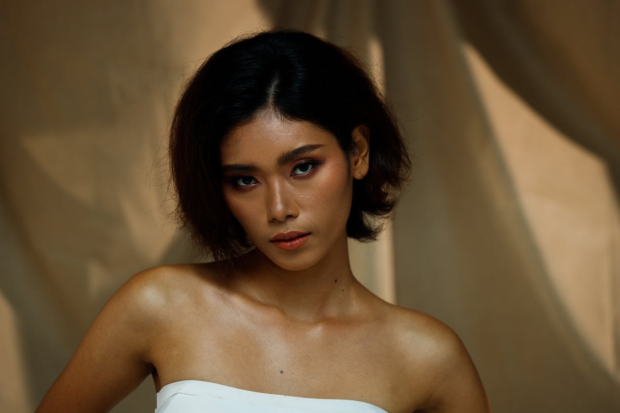 model in white tube top