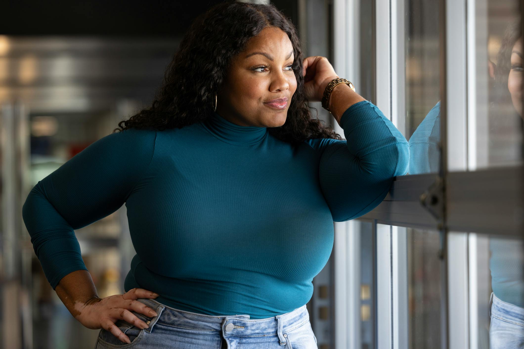 woman gazing out of the window
