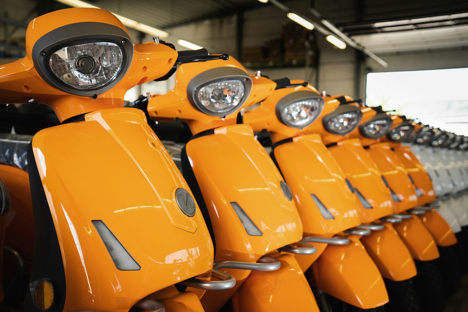 Orange and white e-mopeds