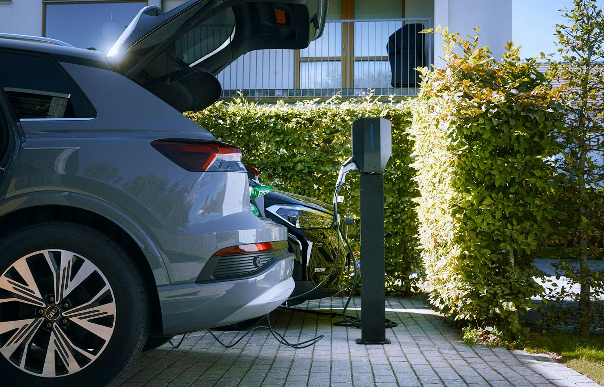 cars charging at charge point