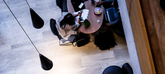 Students studying around a desk