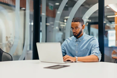 Man at desk with laptop
