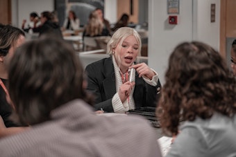 people discussing a solution