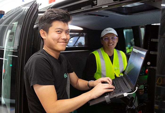 Zoox employee Alvin working on vehicle operations