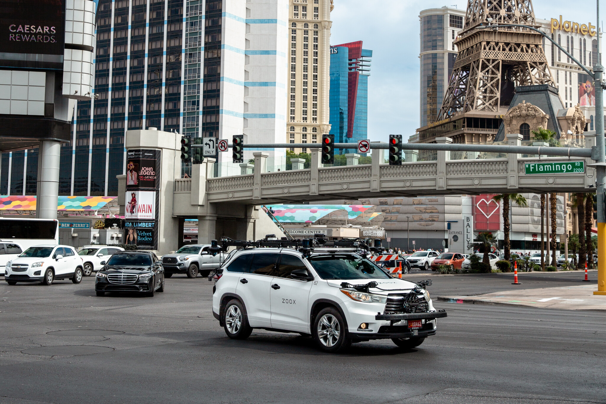 A Zoox test vehicle drives along the Las Vegas Strip