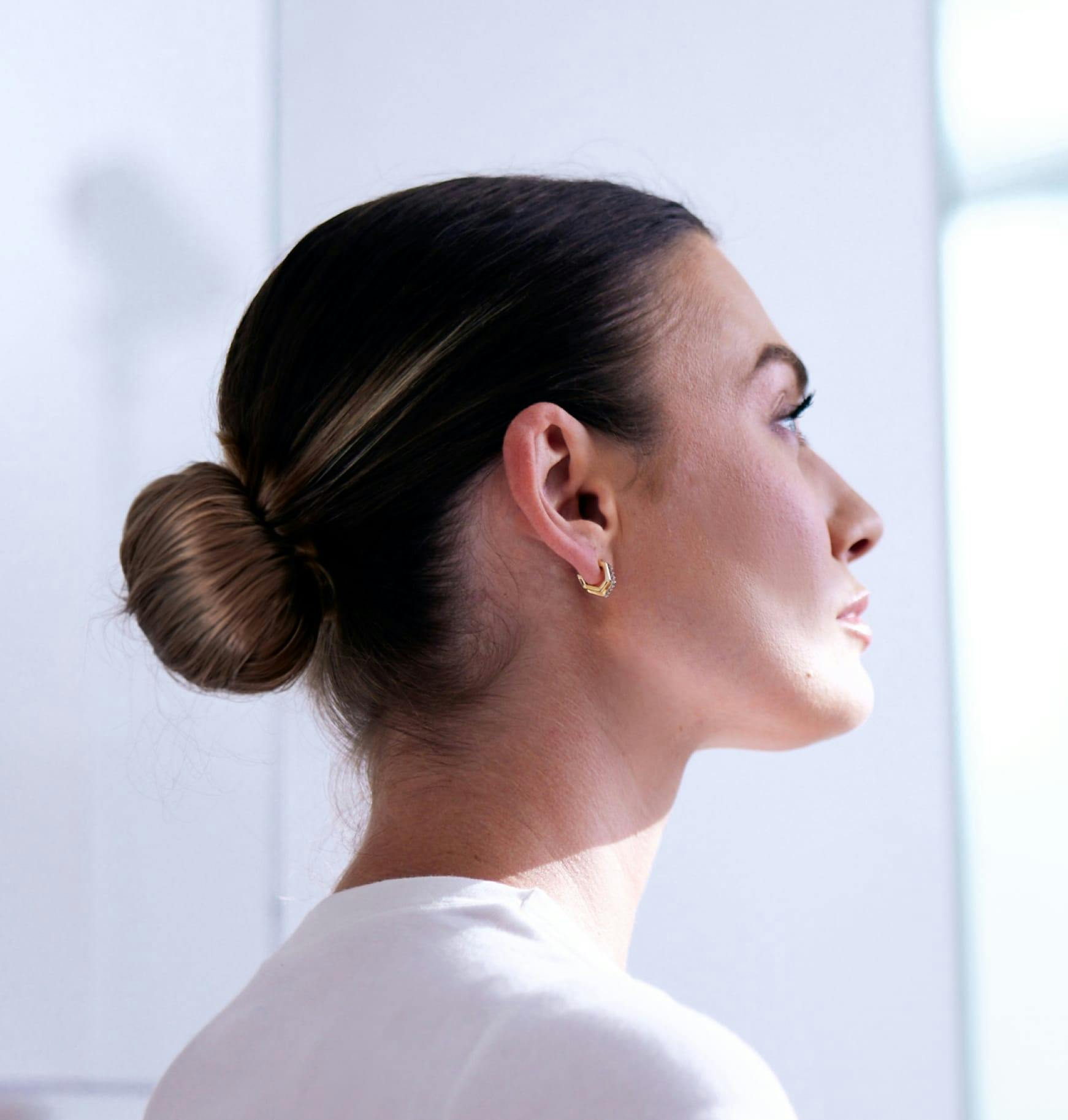 Woman with her hair in a low bun