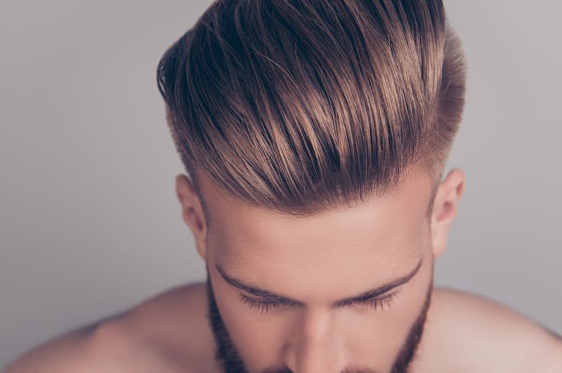 Man's hair slicked back