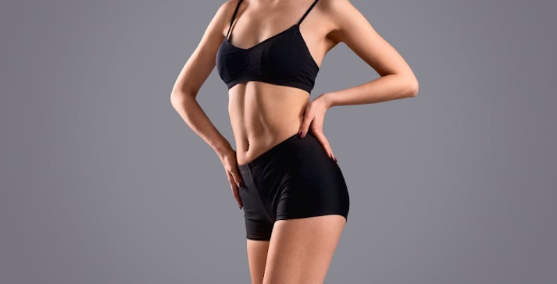 close up of a woman in black bra and underwear posing for a picture