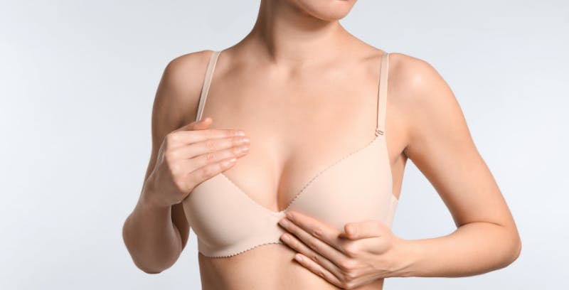 Woman in a nude bra