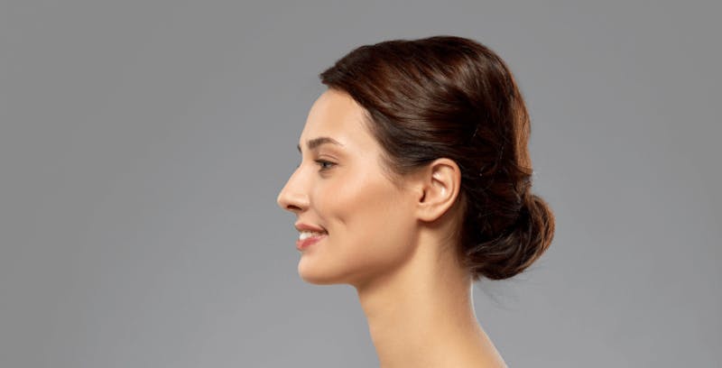 Woman with her hair in a low bun