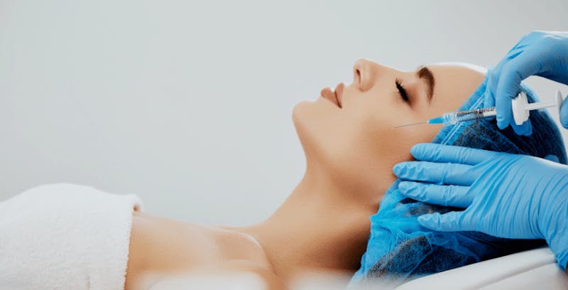 woman getting a botupied by a doctor