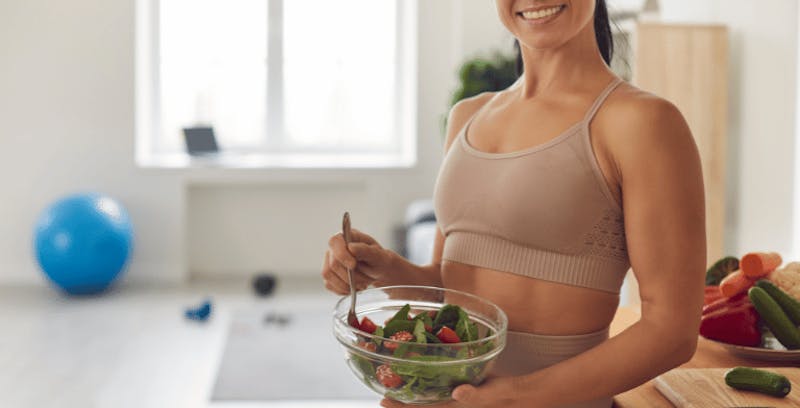 Woman holding a salad bowl