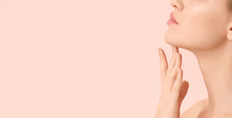 Woman touching her chin