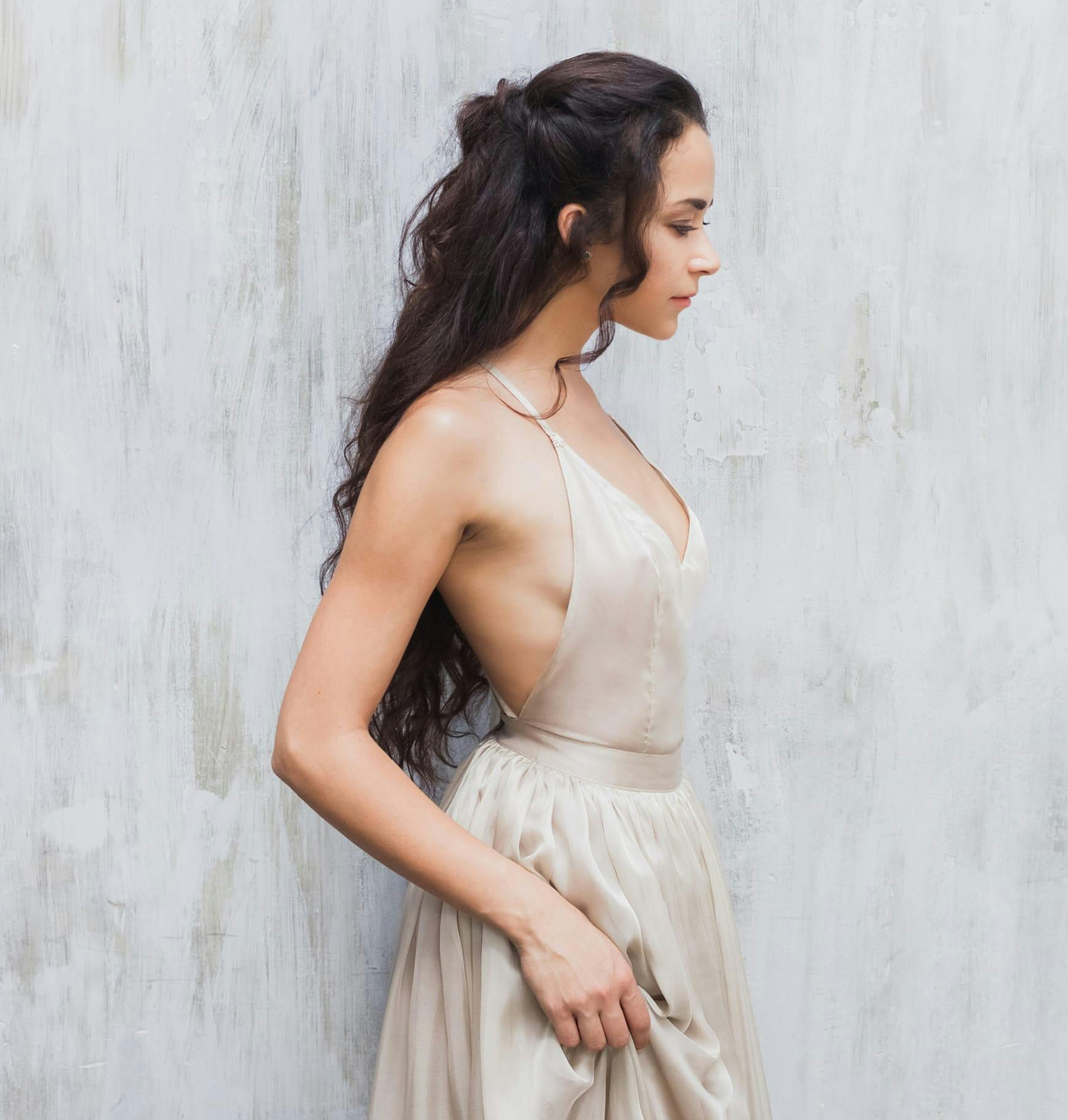 Woman in a long silk dress