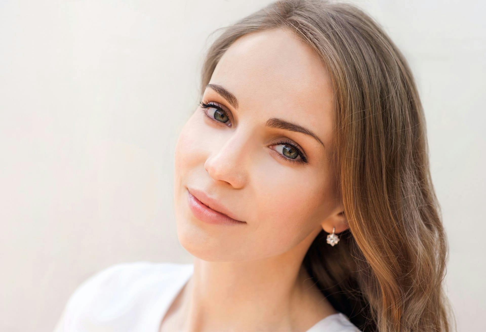 Woman with long light brown hair