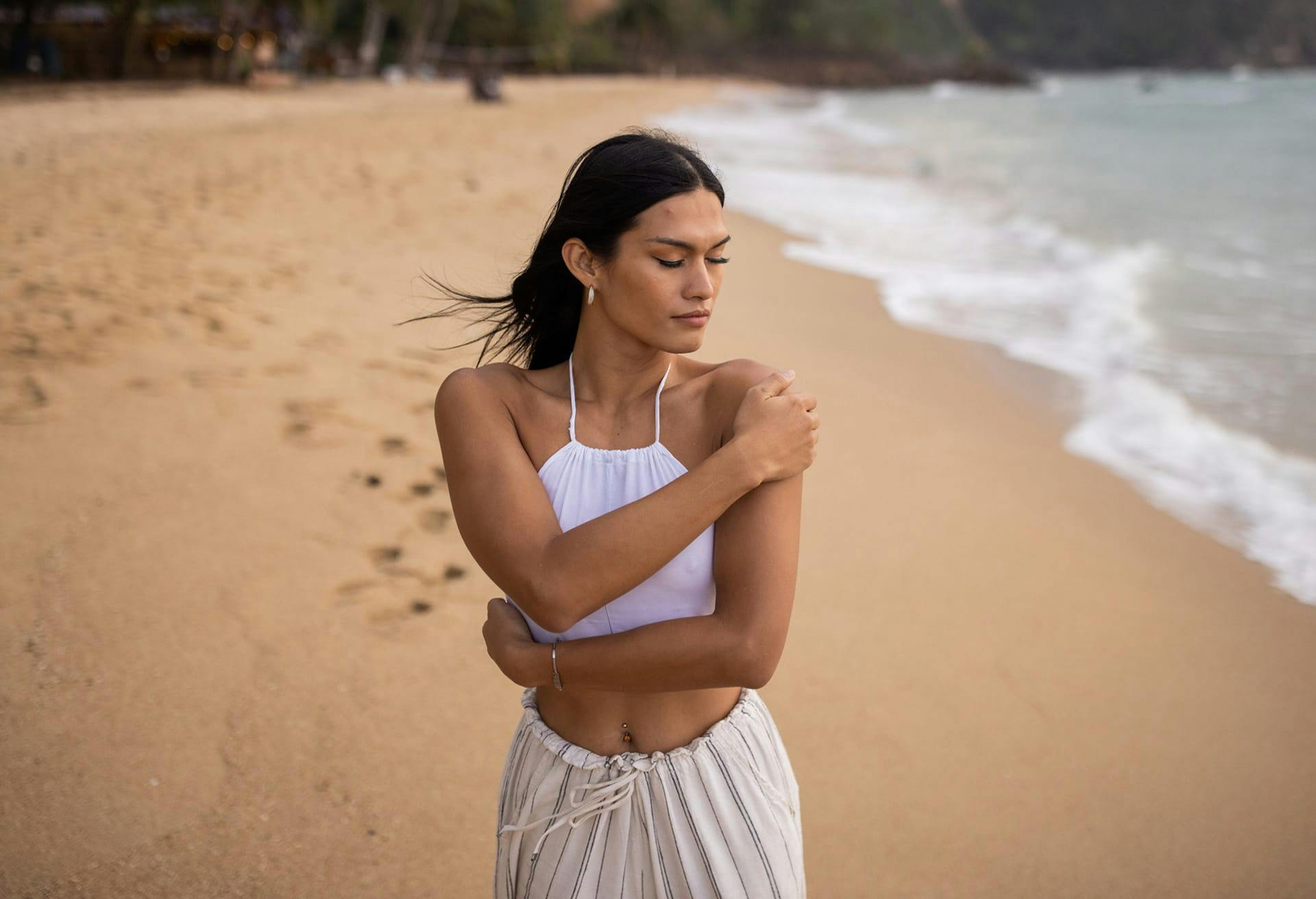 Woman wearing white at the beach