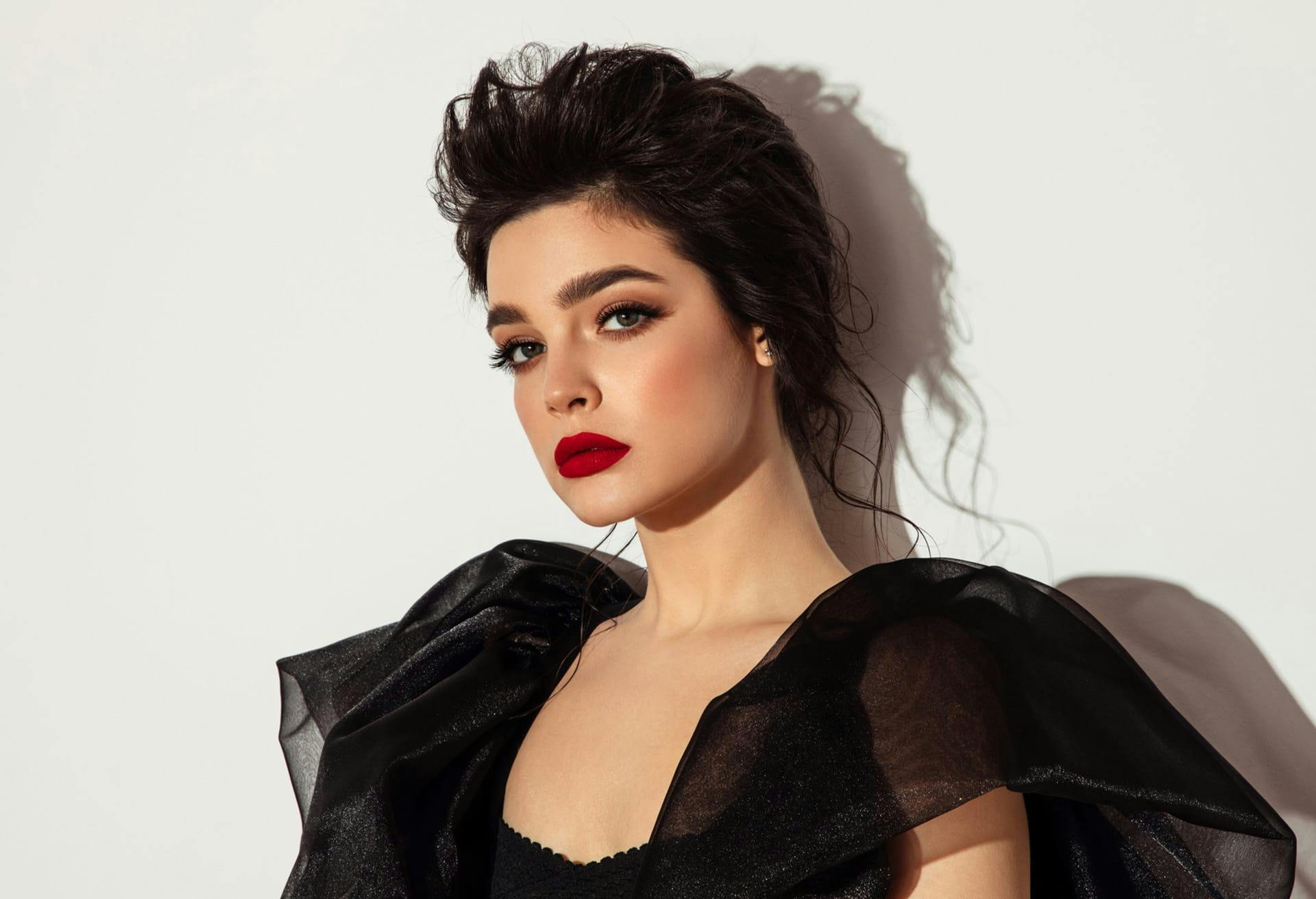 Glamorous woman in a black outfit