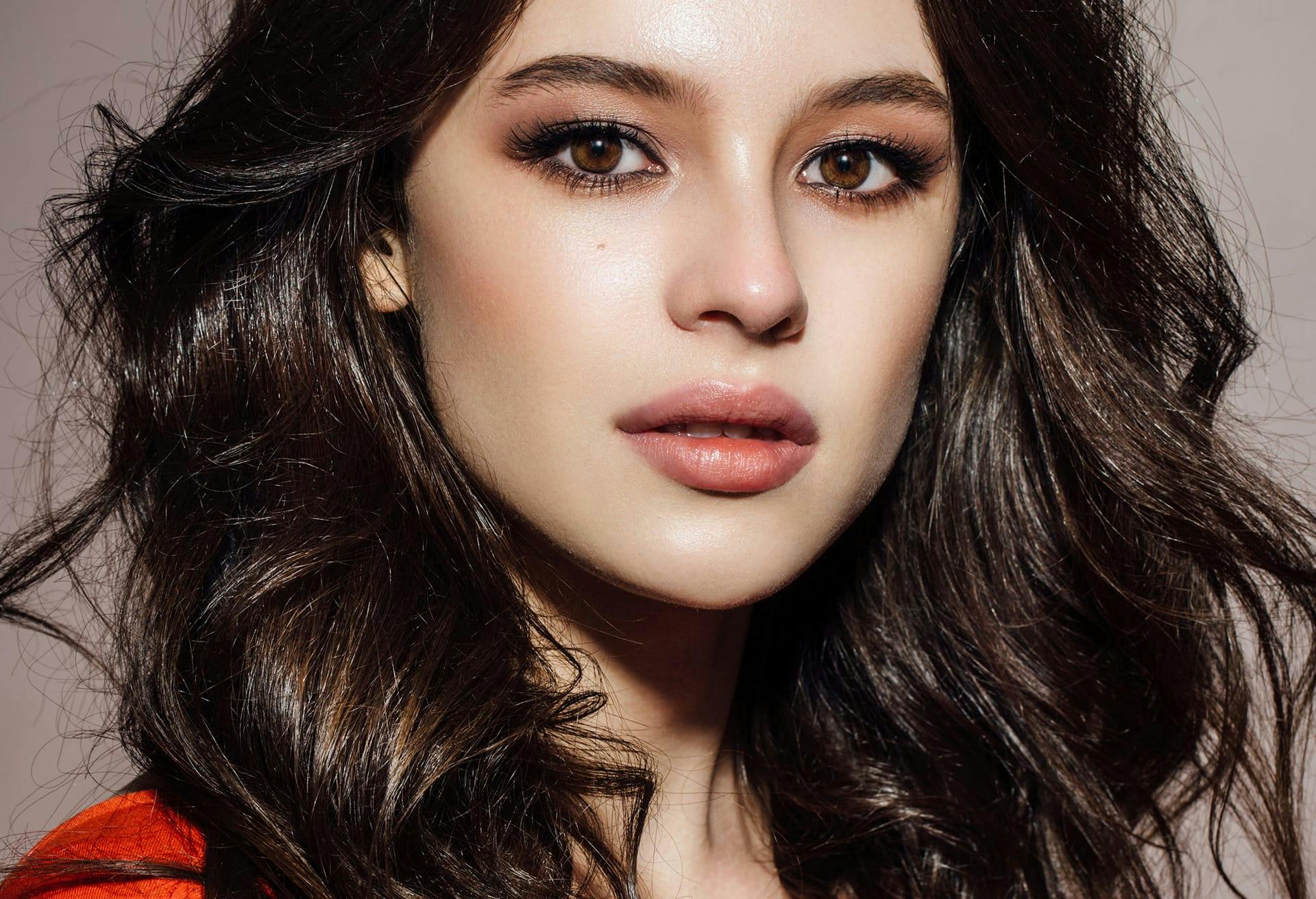 Woman with long wavy dark hair