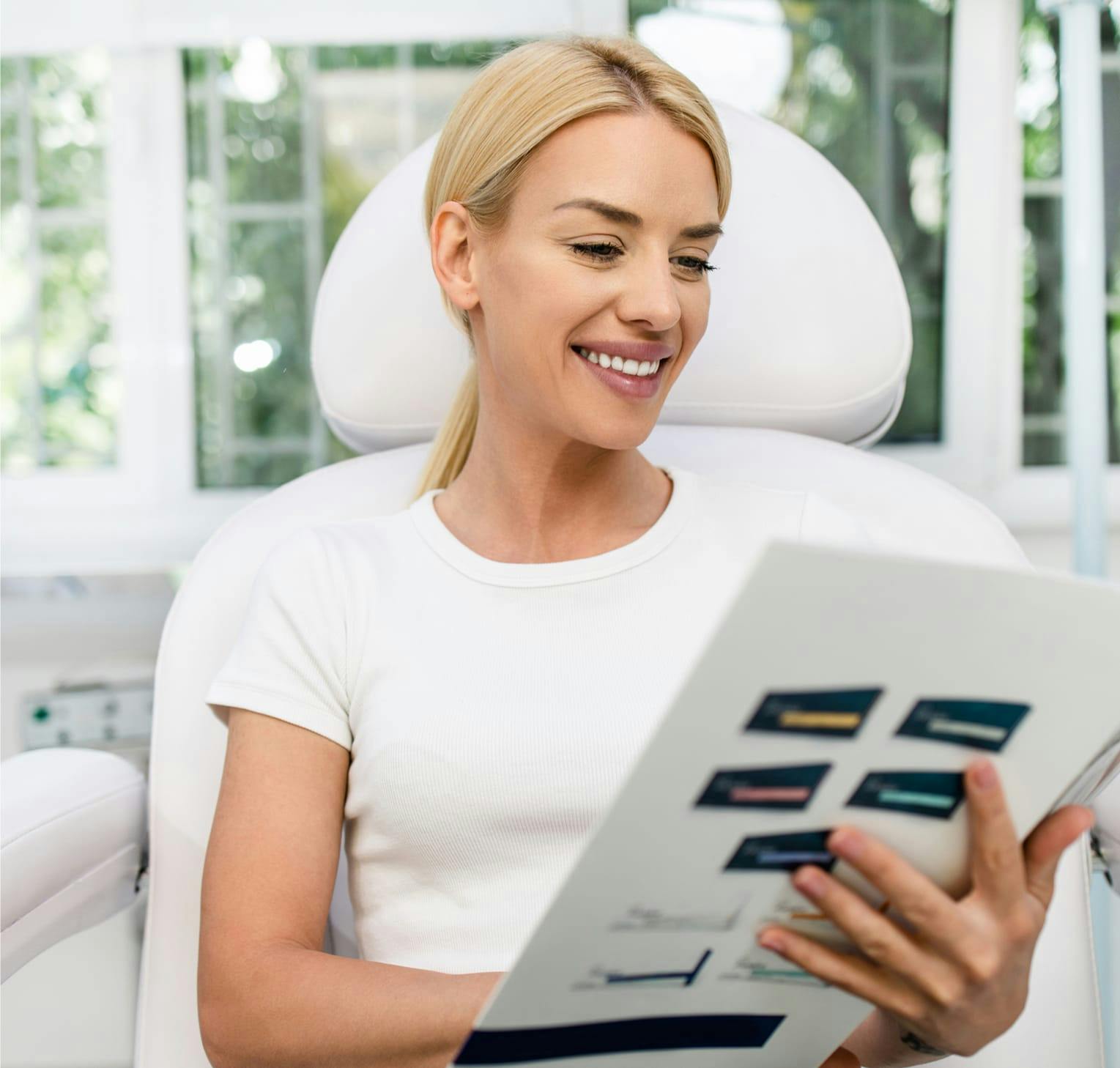 woman looking at booklet