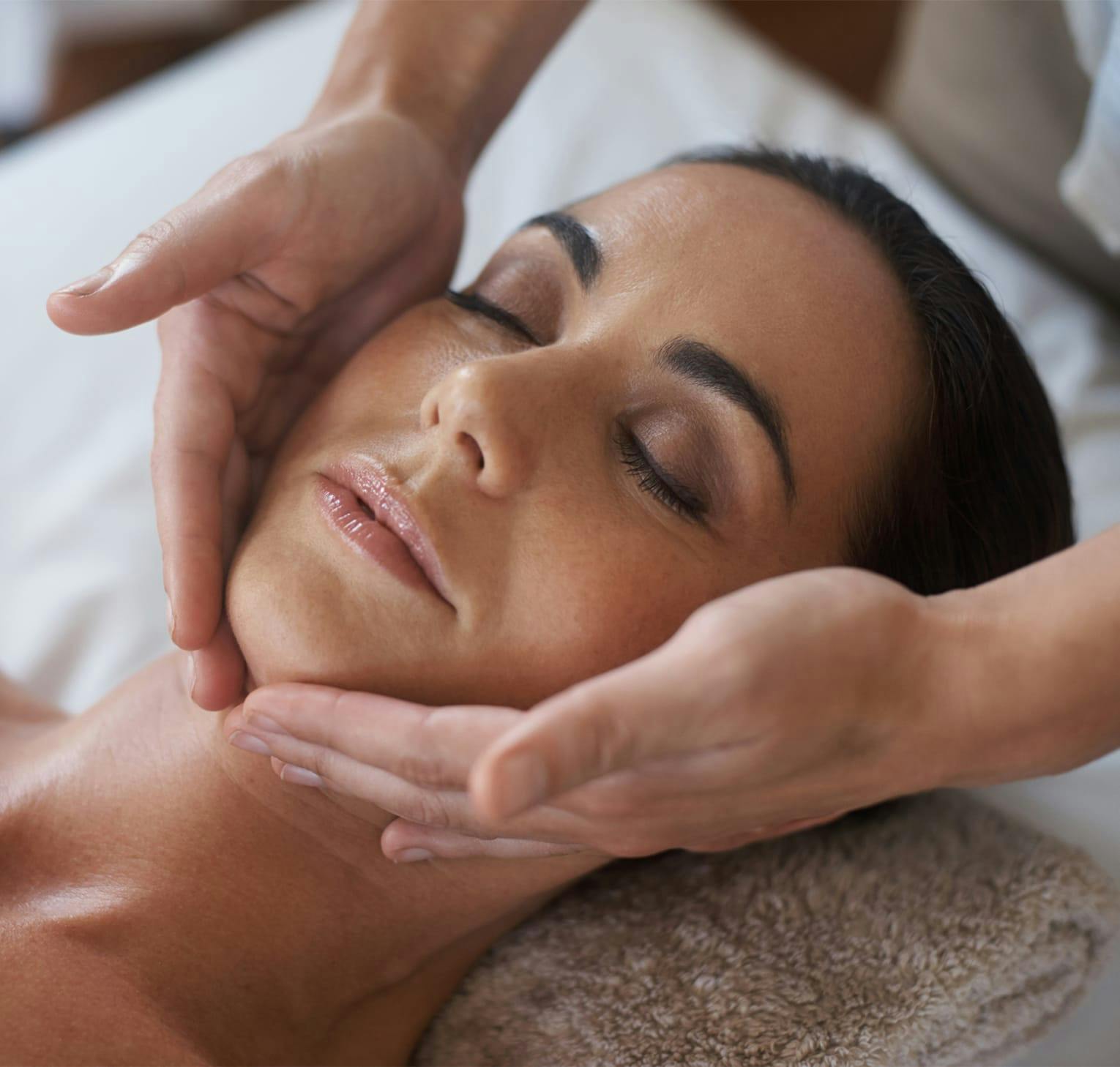 woman getting a facial massage