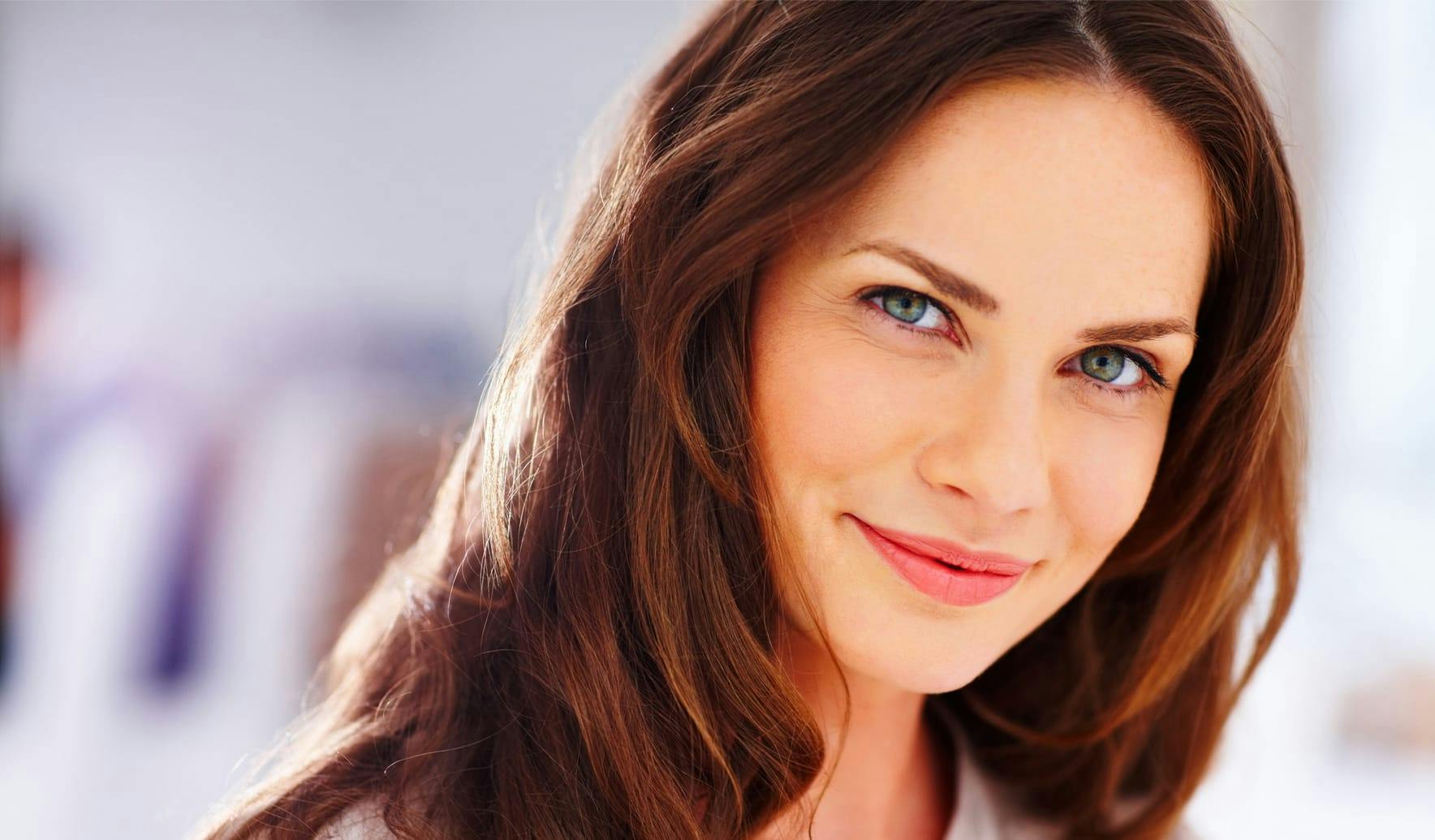 woman with brown hair smiling