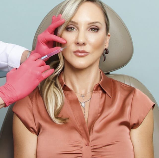 Dr. Lisa Learn receiving injectables