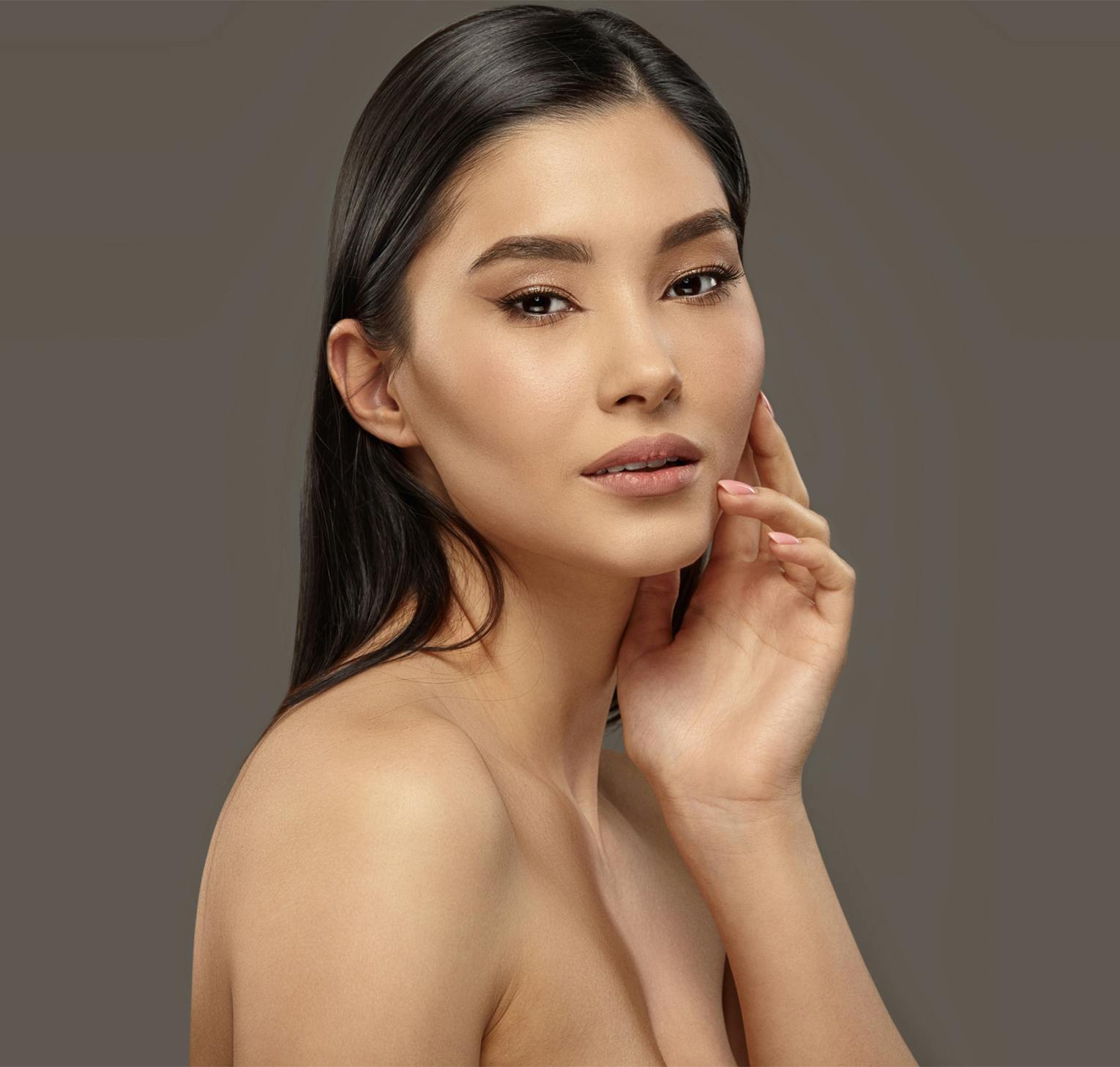 woman touching her chin