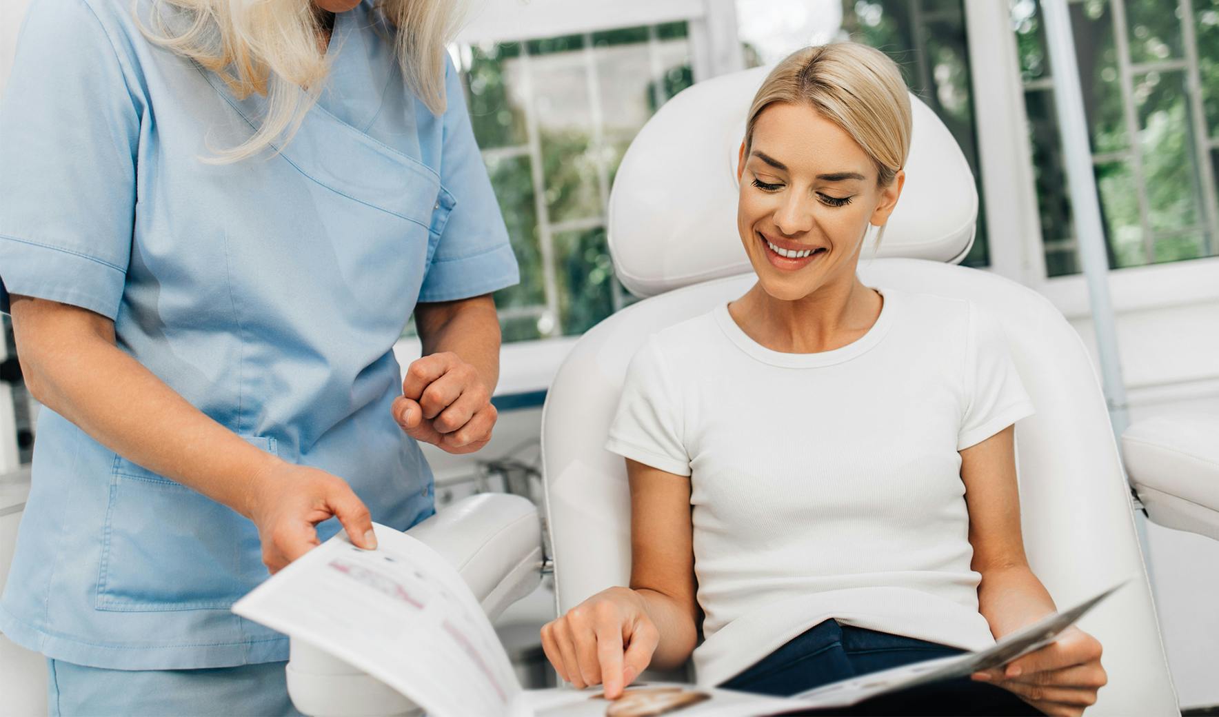 Female patient speaking with staff at Fort Lauderdale Plastic Surgery