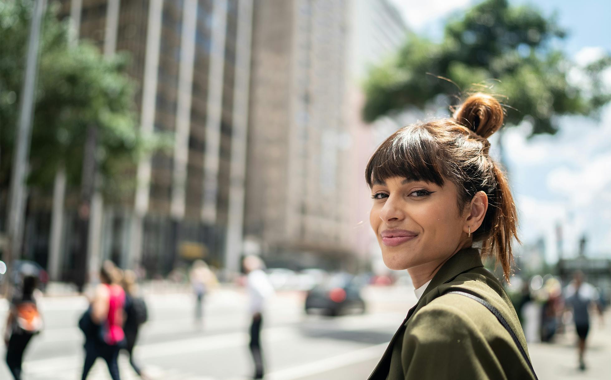 Woman smiling in the city