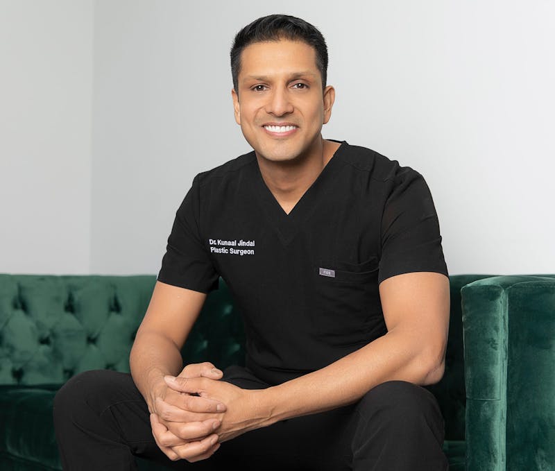 Dr. Kunaal Jindal sitting down on seat