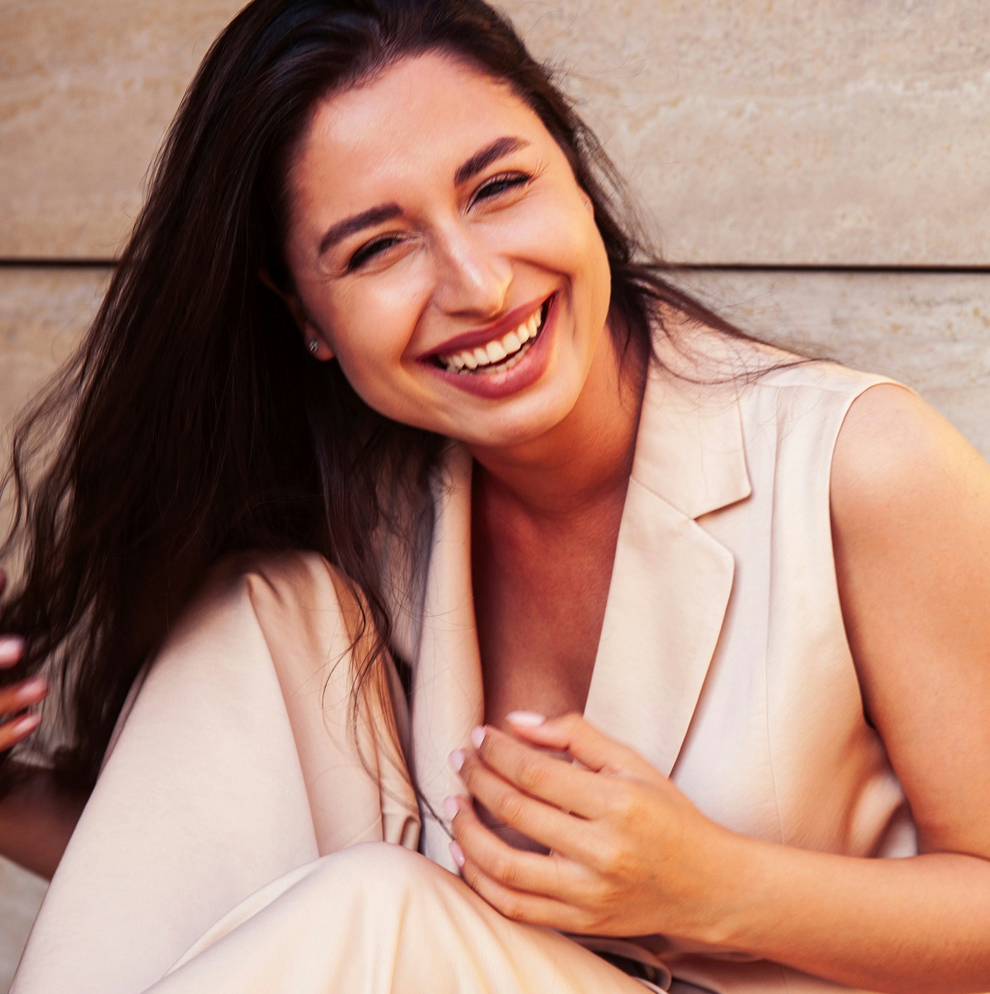 Woman with dark hair, smiling