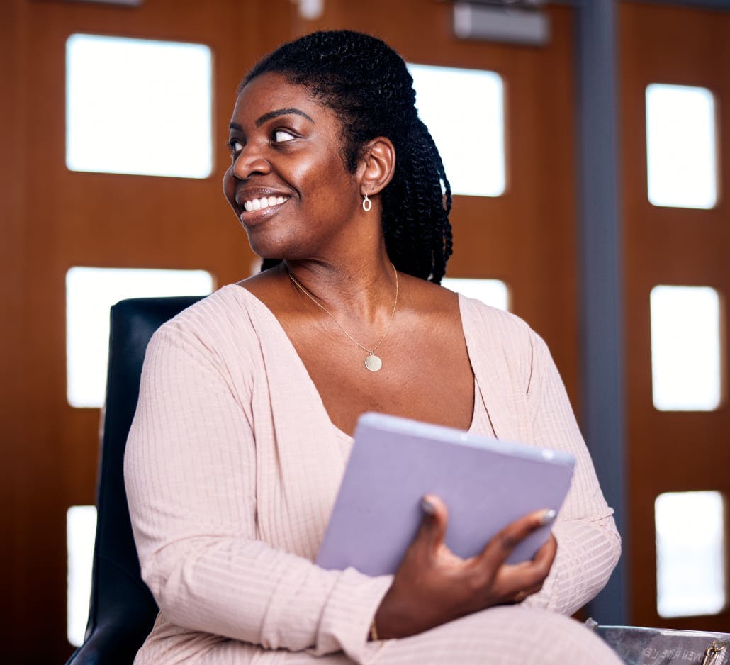 Woman holding an iPad
