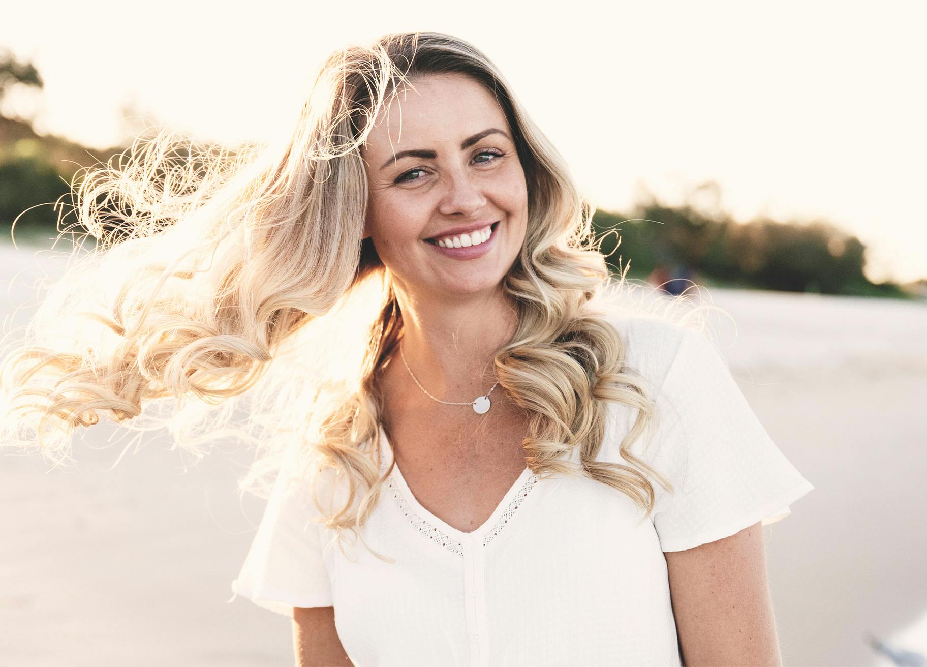 Woman with curly blonde hair