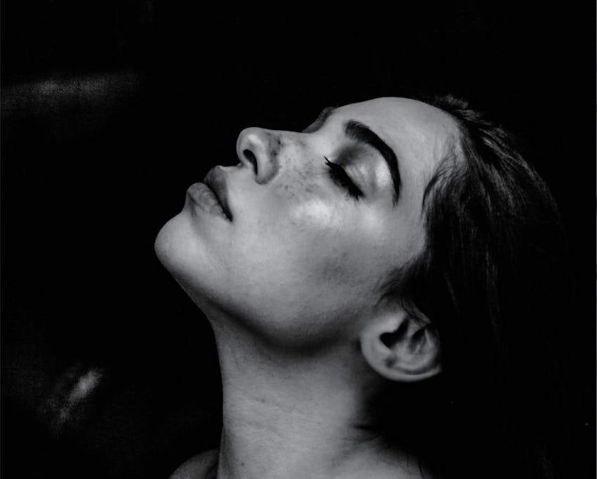 woman side profile with nose up